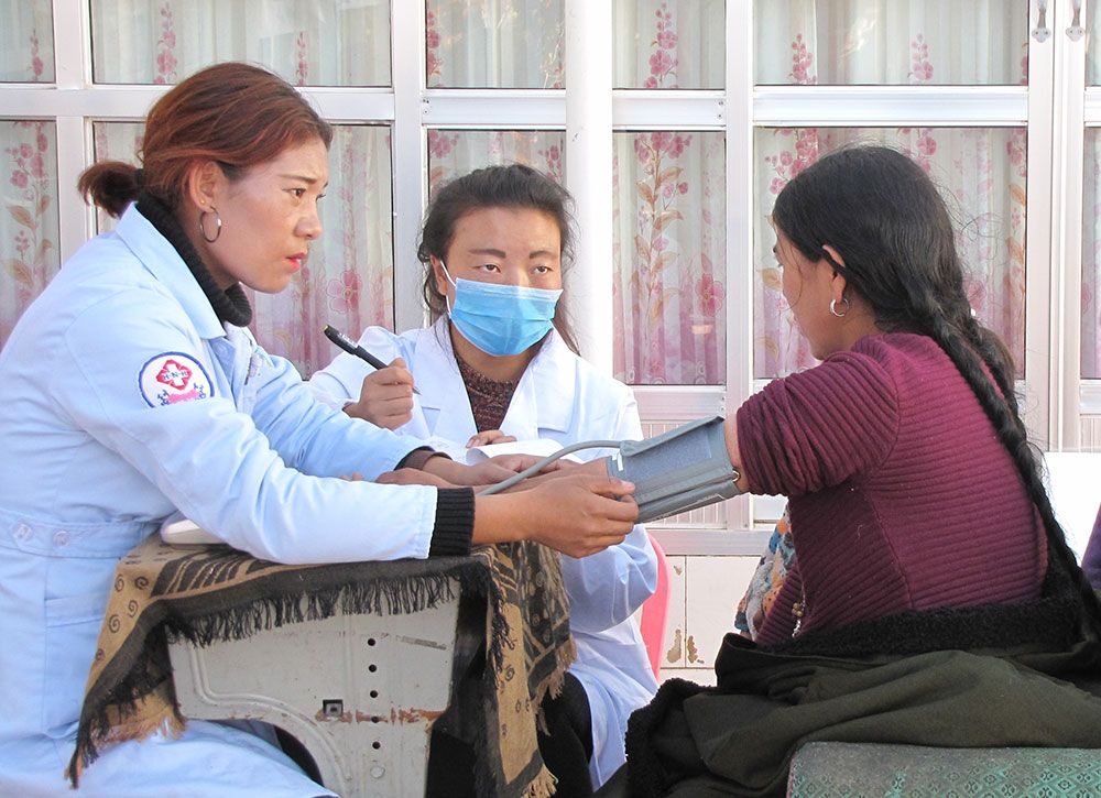 woman receiving health checkup