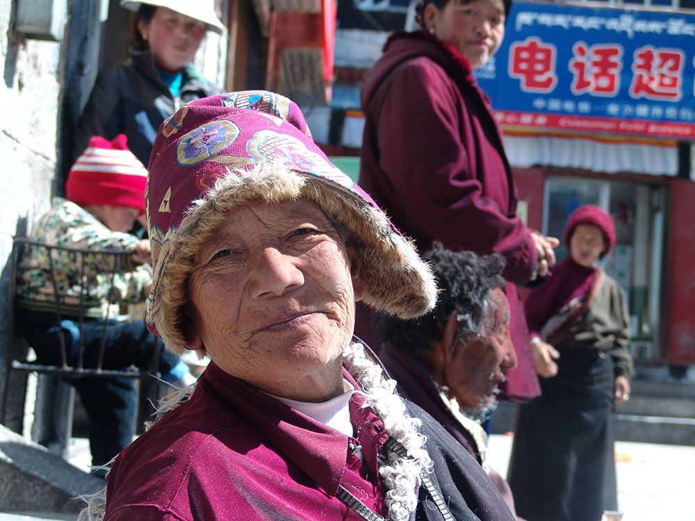Elder Tibetan woman on street